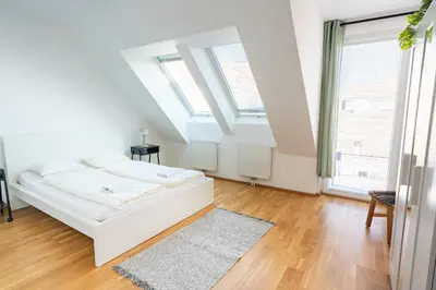 Ein Bett oder Betten in einem Zimmer der Unterkunft Luxury Penthouse with Rooftop Terrace