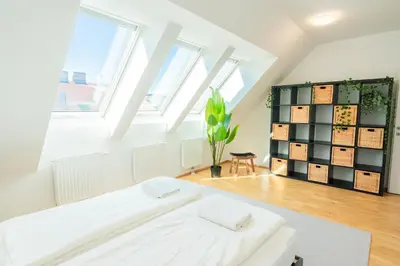 Ein Bett oder Betten in einem Zimmer der Unterkunft Luxury Penthouse with Rooftop Terrace
