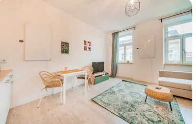 Ein Sitzbereich in der Unterkunft Cute Apartment