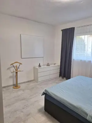 Ein Bett oder Betten in einem Zimmer der Unterkunft Ferienwohnung Anita