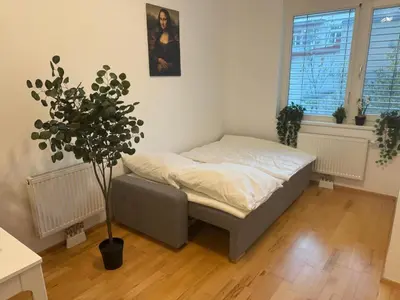 Ein Bett oder Betten in einem Zimmer der Unterkunft Apartment für 4 beim Westbahnhof