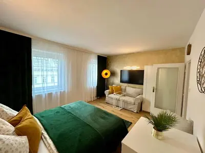 Ein Bett oder Betten in einem Zimmer der Unterkunft Museumsquartier Apartment