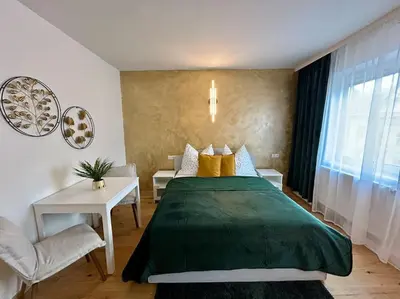 Ein Bett oder Betten in einem Zimmer der Unterkunft Museumsquartier Apartment