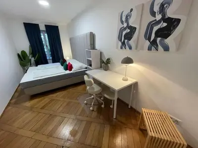 Ein Bett oder Betten in einem Zimmer der Unterkunft Tranquil City Retreat