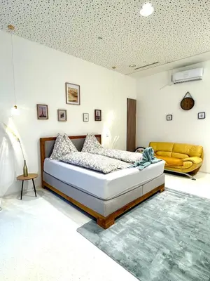 Ein Bett oder Betten in einem Zimmer der Unterkunft Central Opera Apartment 140 m2