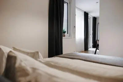 Ein Bett oder Betten in einem Zimmer der Unterkunft Augarten City Loft with terrace