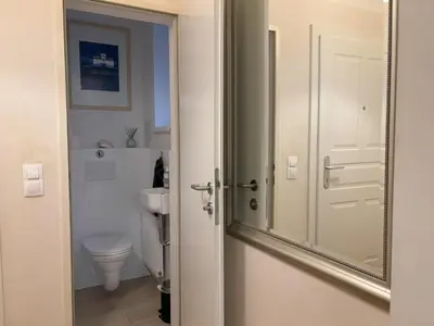 Ein Badezimmer in der Unterkunft Moderne Stadtwohnung mit Balkon