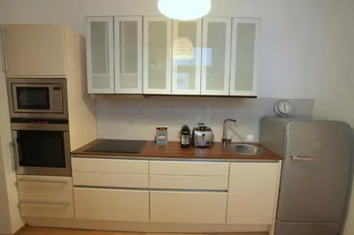 Küche/Küchenzeile in der Unterkunft Moderne Stadtwohnung mit Balkon