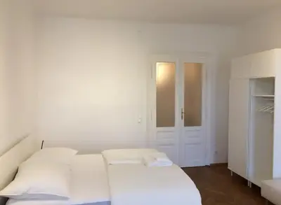 Ein Bett oder Betten in einem Zimmer der Unterkunft My Stay Apartments
