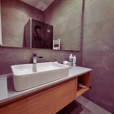 Ein Badezimmer in der Unterkunft WEST APARTMENTS city center