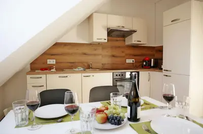 Küche/Küchenzeile in der Unterkunft geräumige Dachgeschoßwohnung