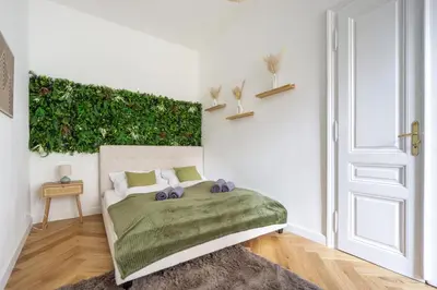 Ein Bett oder Betten in einem Zimmer der Unterkunft Central elegant Heritage Apartment with modern comfort