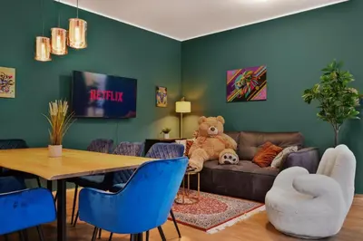 Ein Sitzbereich in der Unterkunft Grand Urban Residence Apartment