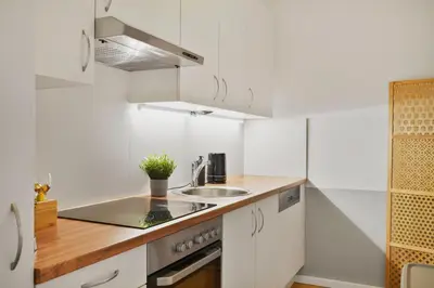 Küche/Küchenzeile in der Unterkunft Grand Urban Residence Apartment