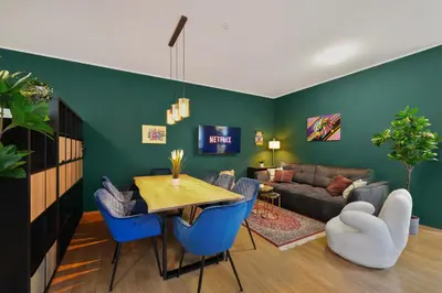 Ein Sitzbereich in der Unterkunft Grand Urban Residence Apartment