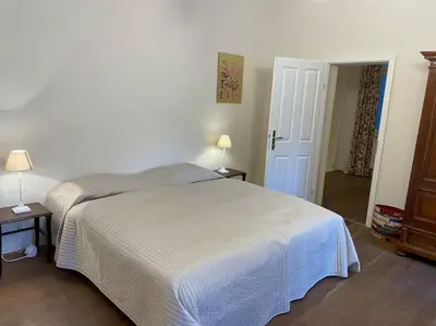 Ein Bett oder Betten in einem Zimmer der Unterkunft Quiet apartment close to center