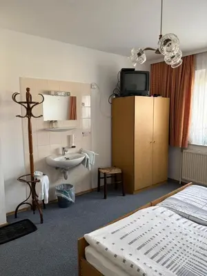 Ein Bett oder Betten in einem Zimmer der Unterkunft Pension Eicher