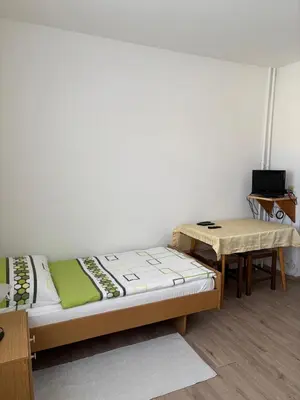 Ein Bett oder Betten in einem Zimmer der Unterkunft Pension Eicher