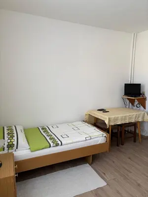 Ein Bett oder Betten in einem Zimmer der Unterkunft Pension Eicher