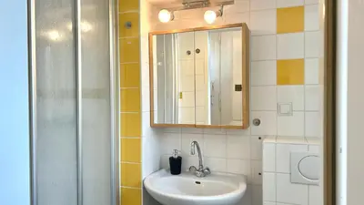 Ein Badezimmer in der Unterkunft City Center Apartment
