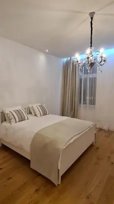 Ein Bett oder Betten in einem Zimmer der Unterkunft TOP Apartments Schönbrunn
