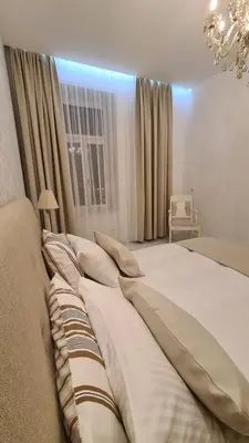Ein Bett oder Betten in einem Zimmer der Unterkunft TOP Apartments Schönbrunn