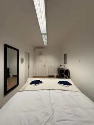 Ein Bett oder Betten in einem Zimmer der Unterkunft Royal Apartment Vienna