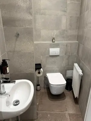 Ein Badezimmer in der Unterkunft Elegant und Zentral - Apartment nahe Staatsoper und Altstadt