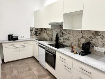 Küche/Küchenzeile in der Unterkunft Elegant und Zentral - Apartment nahe Staatsoper und Altstadt