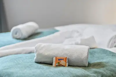 Ein Bett oder Betten in einem Zimmer der Unterkunft NobleNest Deluxe - Massage - Kaffee - Arbeitsplatz