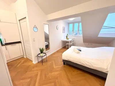 Ein Bett oder Betten in einem Zimmer der Unterkunft Simply Sec Apartment