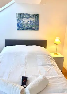 Ein Bett oder Betten in einem Zimmer der Unterkunft Simply Sec Apartment