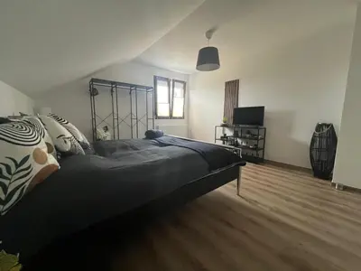Ein Bett oder Betten in einem Zimmer der Unterkunft Vöslau Panorama near Vienna