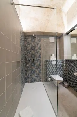 Ein Badezimmer in der Unterkunft AWerner Suites Belvedere - Der Schlosser