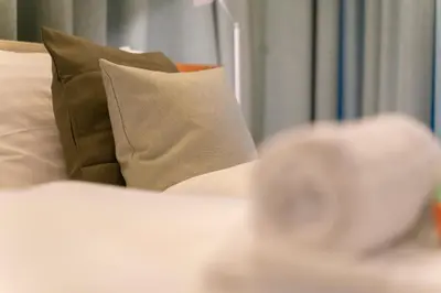 Ein Bett oder Betten in einem Zimmer der Unterkunft AWerner Suites Belvedere - Der Schlosser