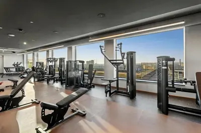 Das Fitnesscenter und/oder die Fitnesseinrichtungen in der Unterkunft HANS-Y Apartments inklusive Outdoorpool & Bar