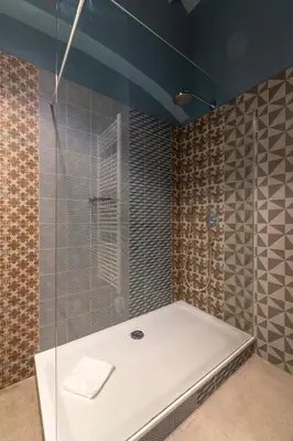 Ein Badezimmer in der Unterkunft AWerner Suites Belvedere - Der Eisenwarenhändler
