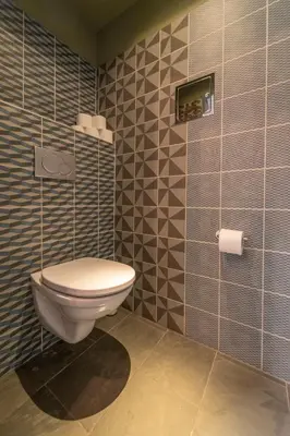 Ein Badezimmer in der Unterkunft AWerner Suites Belvedere - Der Tischler