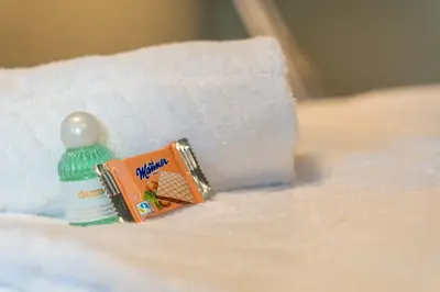 Ein Bett oder Betten in einem Zimmer der Unterkunft AWerner Suites Belvedere - Der Tischler