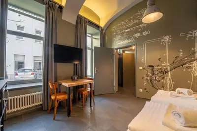 TV/Unterhaltungsangebot in der Unterkunft AWerner Suites Belvedere - Der Tischler