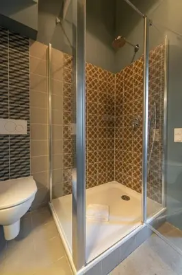 Ein Badezimmer in der Unterkunft AWerner Suites Belvedere - Der Schmied