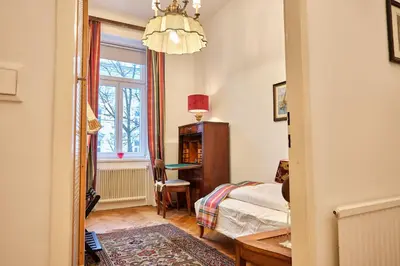 Ein Bett oder Betten in einem Zimmer der Unterkunft Slow Living I Schönbrunn und Park nähe I Penzing Bahnhof
