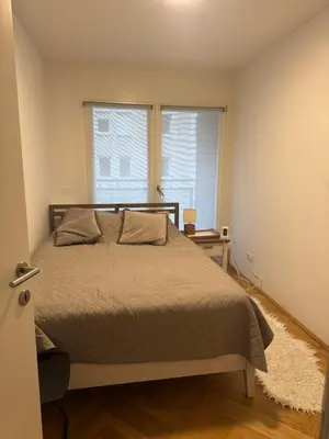 Ein Bett oder Betten in einem Zimmer der Unterkunft Modern apartment to stay in Vienna