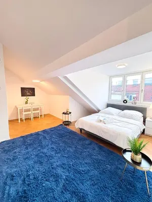 Ein Bett oder Betten in einem Zimmer der Unterkunft Simply Five Apartment
