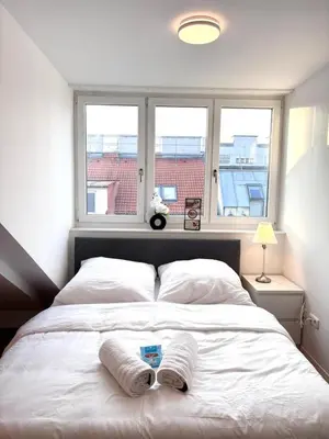 Ein Bett oder Betten in einem Zimmer der Unterkunft Simply Five Apartment