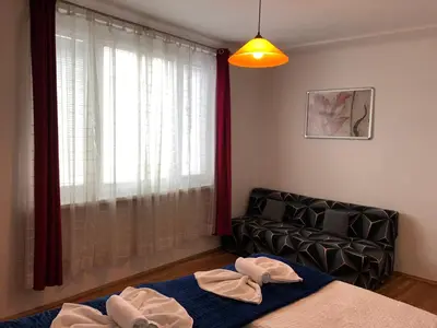 Ein Bett oder Betten in einem Zimmer der Unterkunft Apartment Domino