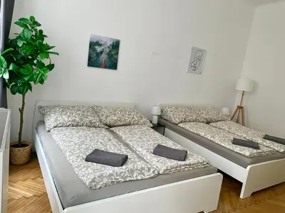 Ein Bett oder Betten in einem Zimmer der Unterkunft Cosy Apartment with Terrace & Free Parking