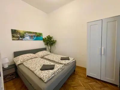Ein Bett oder Betten in einem Zimmer der Unterkunft Cosy Apartment with Terrace & Free Parking