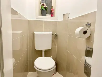 Ein Badezimmer in der Unterkunft Cosy Apartment with Terrace & Free Parking