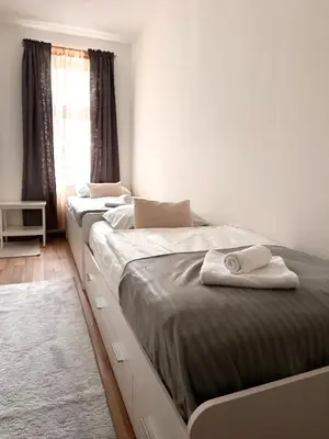 Ein Bett oder Betten in einem Zimmer der Unterkunft X Apartment Vienna